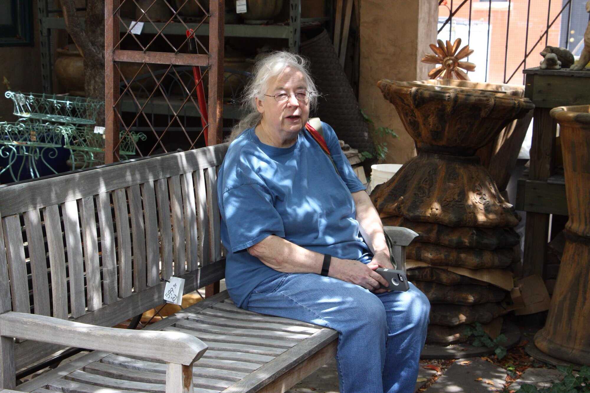 Susan Robbins sitting on a park bench