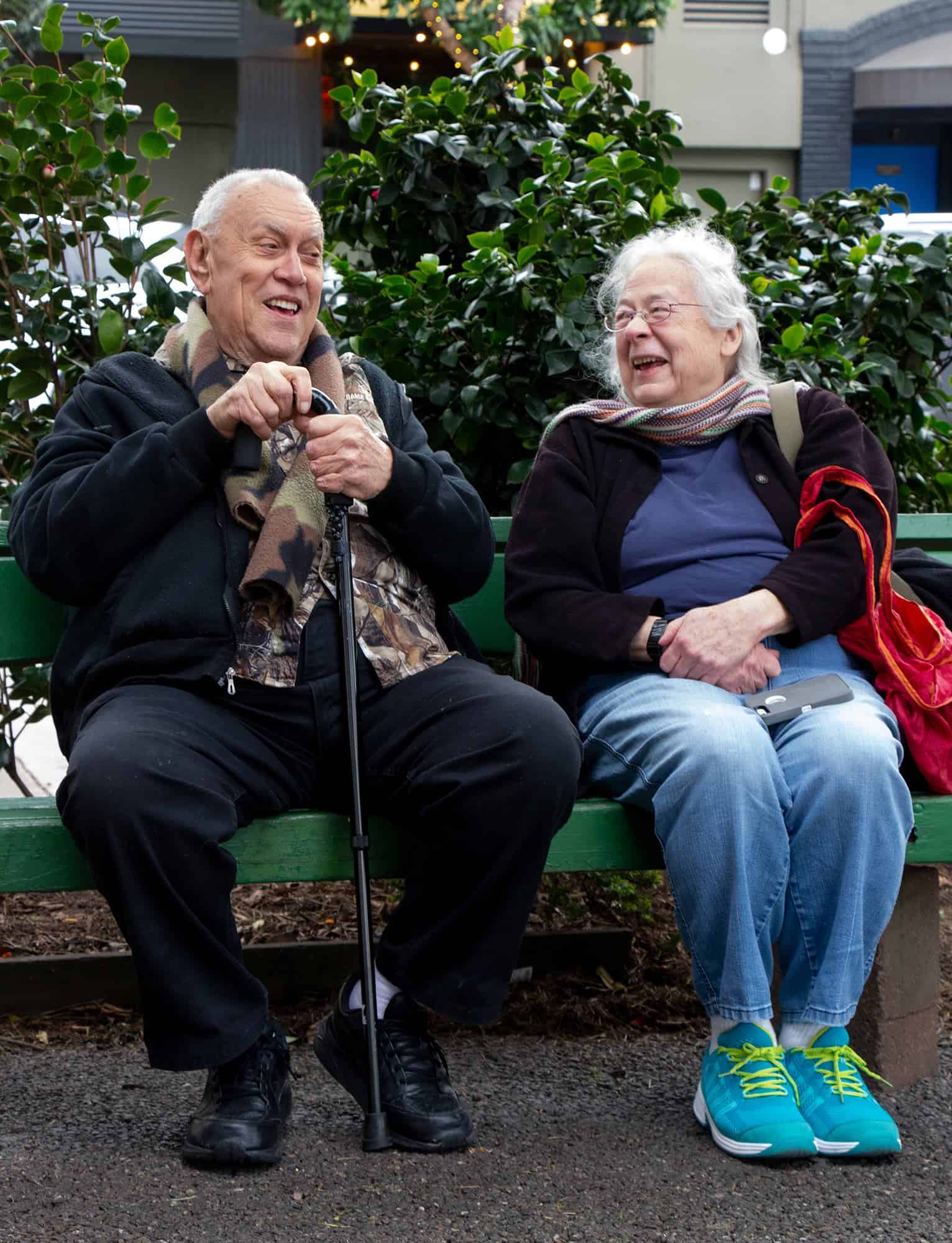 Jim Jet and Susan Robbins sitting on a park bench