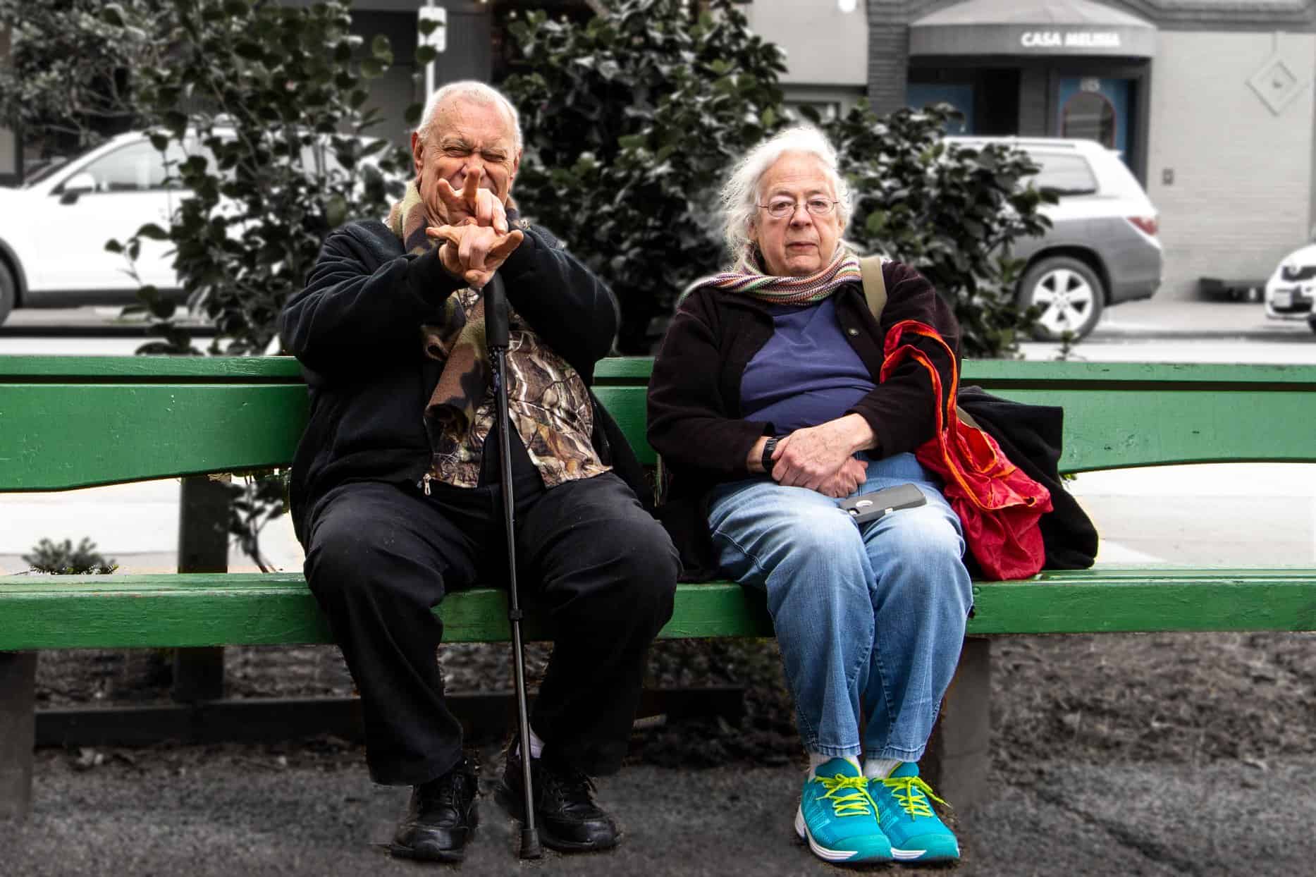 Jim Jet and Susan Robbins sitting on a park bench